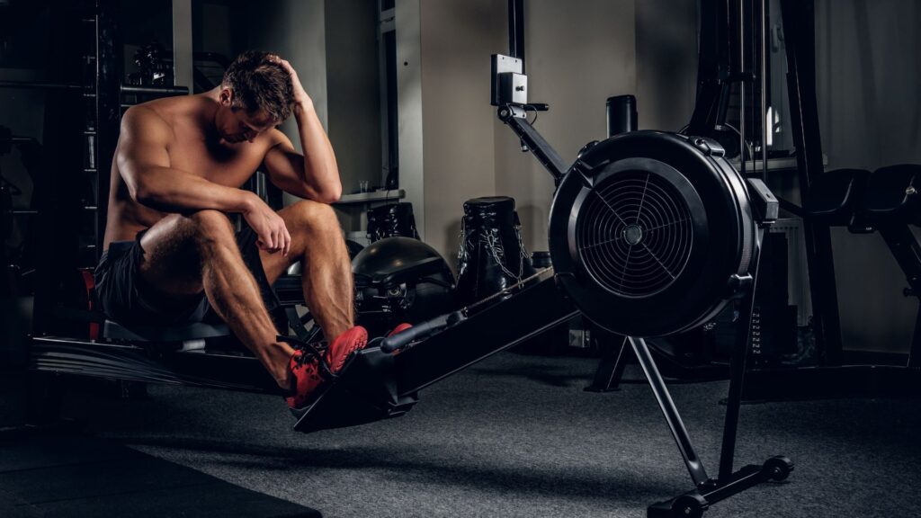 homem cansado maquina