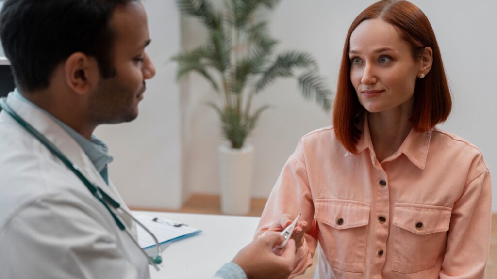 medico consulta paciente